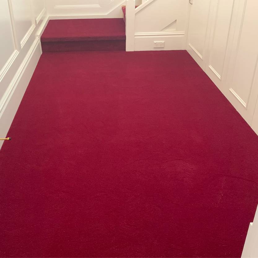 red hallway and stairs