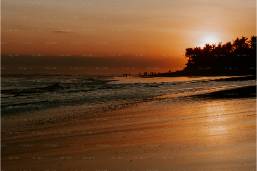 Sunset view over a beach at the hotel resort area
