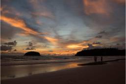 Sunset view over the beach with ocean and small islands