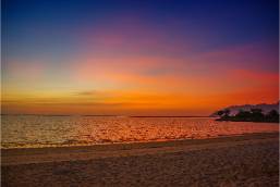Beach view at sunset near the hotel shoreline area