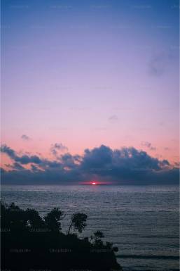 Ocean view at sunset seen from a coastal hotel location