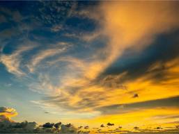 Colorful sky at sunset with clouds over hotel area