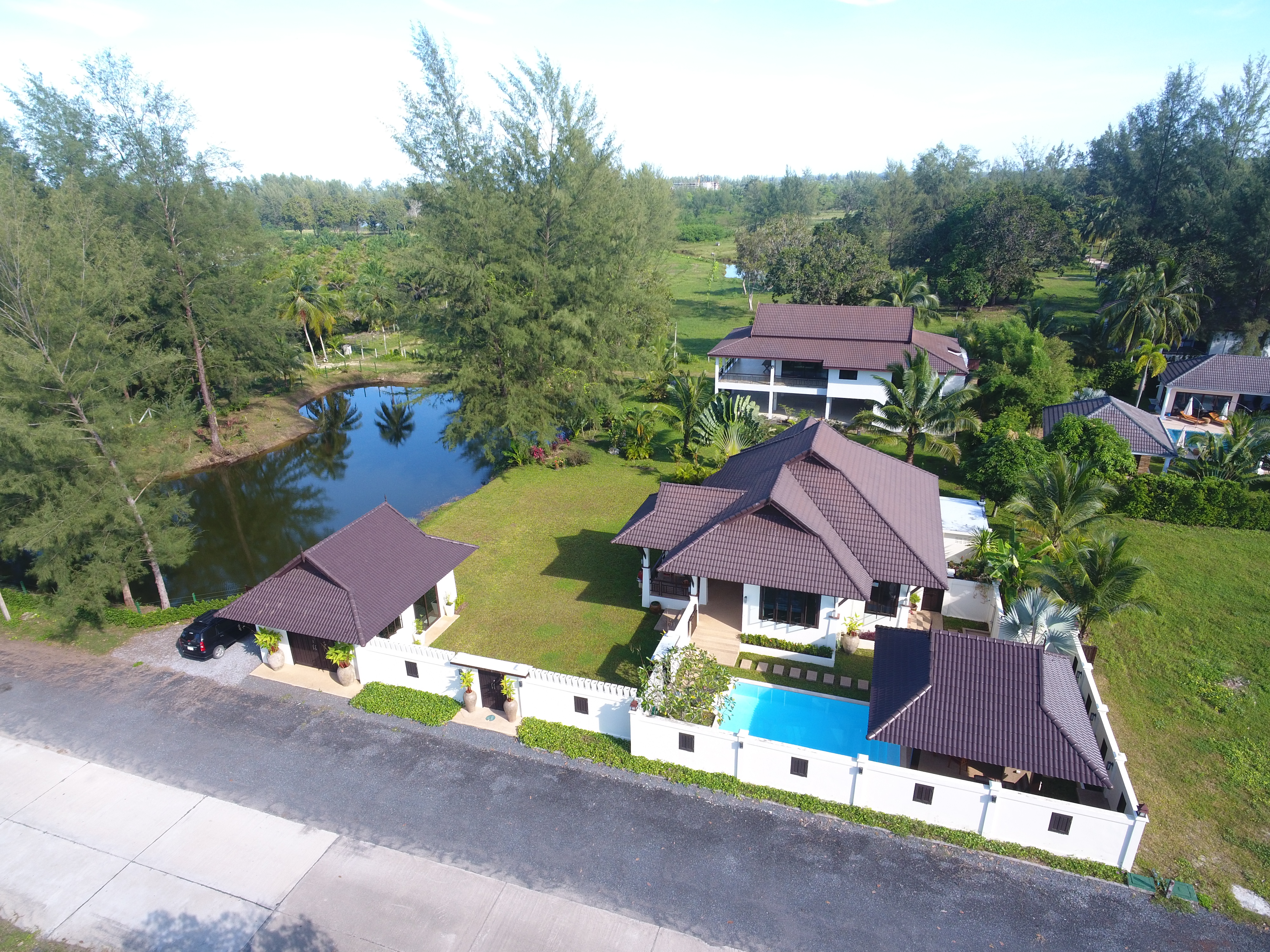 Owner-supplied aerial/drone still from the Thai Life Beach House property archive (DJI_0125). Useful for understanding the property and surrounding setting; it should not be treated as a survey or boundary plan.