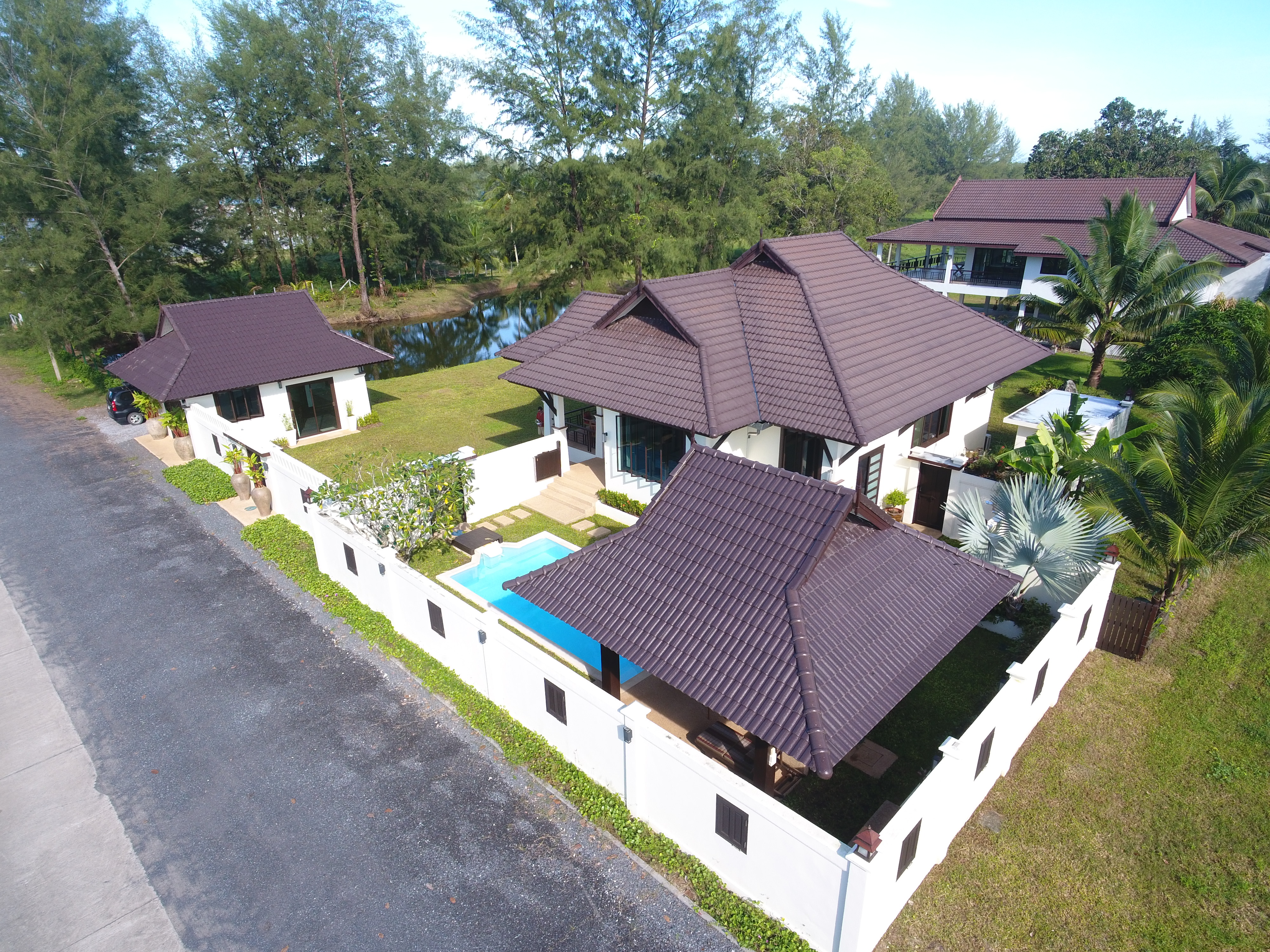 Owner-supplied aerial/drone still from the Thai Life Beach House property archive (DJI_0126). Useful for understanding the property and surrounding setting; it should not be treated as a survey or boundary plan.