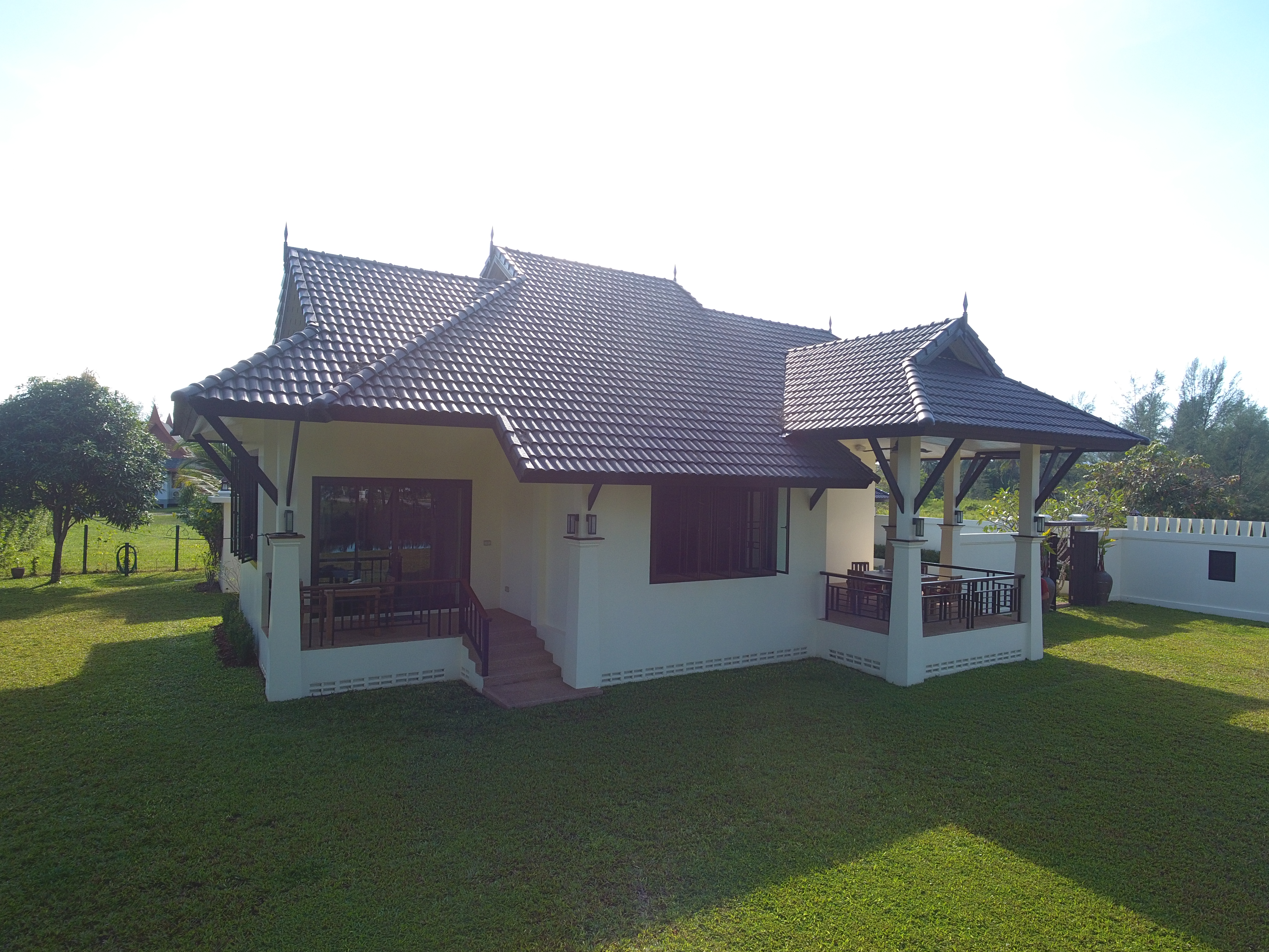 Owner-supplied aerial/drone still from the Thai Life Beach House property archive (DJI_0131). Useful for understanding the property and surrounding setting; it should not be treated as a survey or boundary plan.