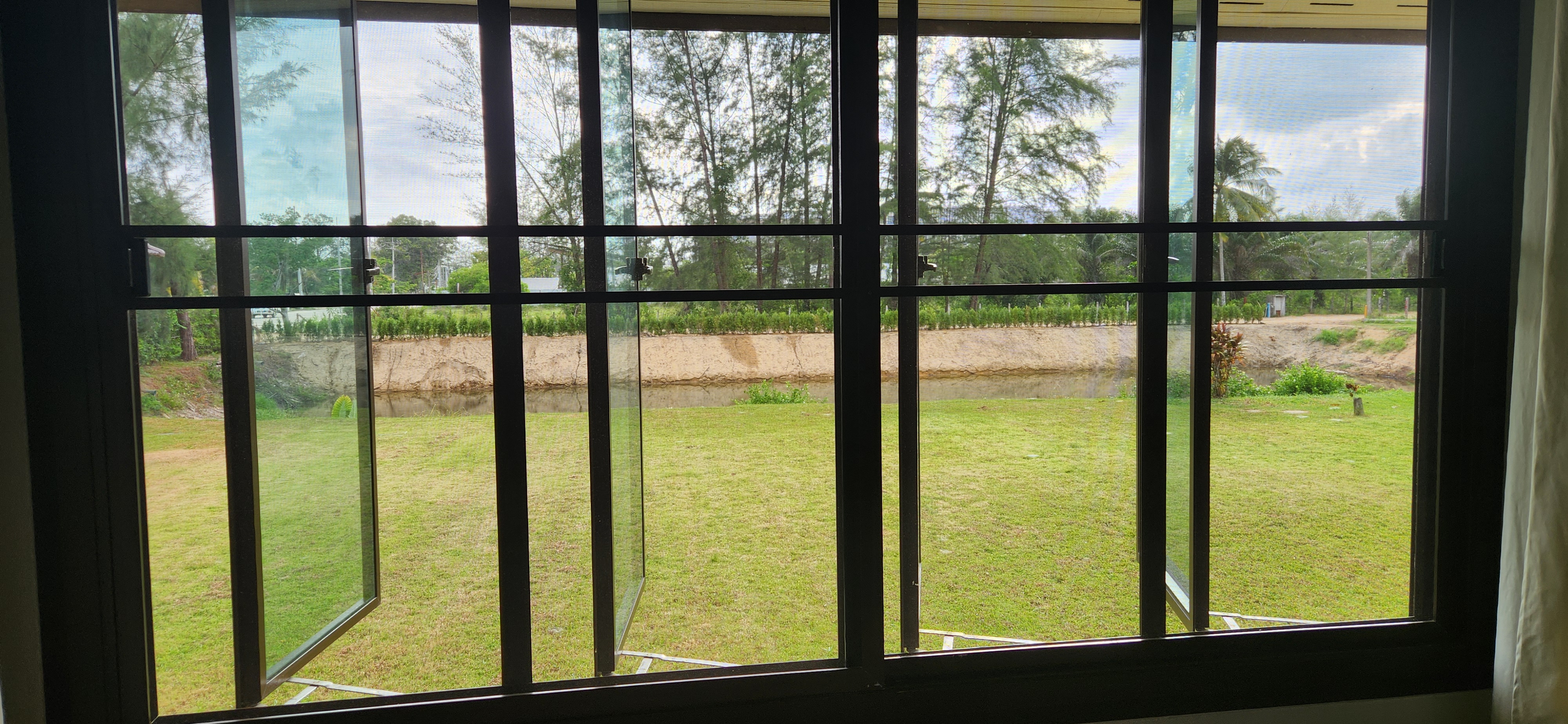 Thai Life Beach House Garden View Through Windows