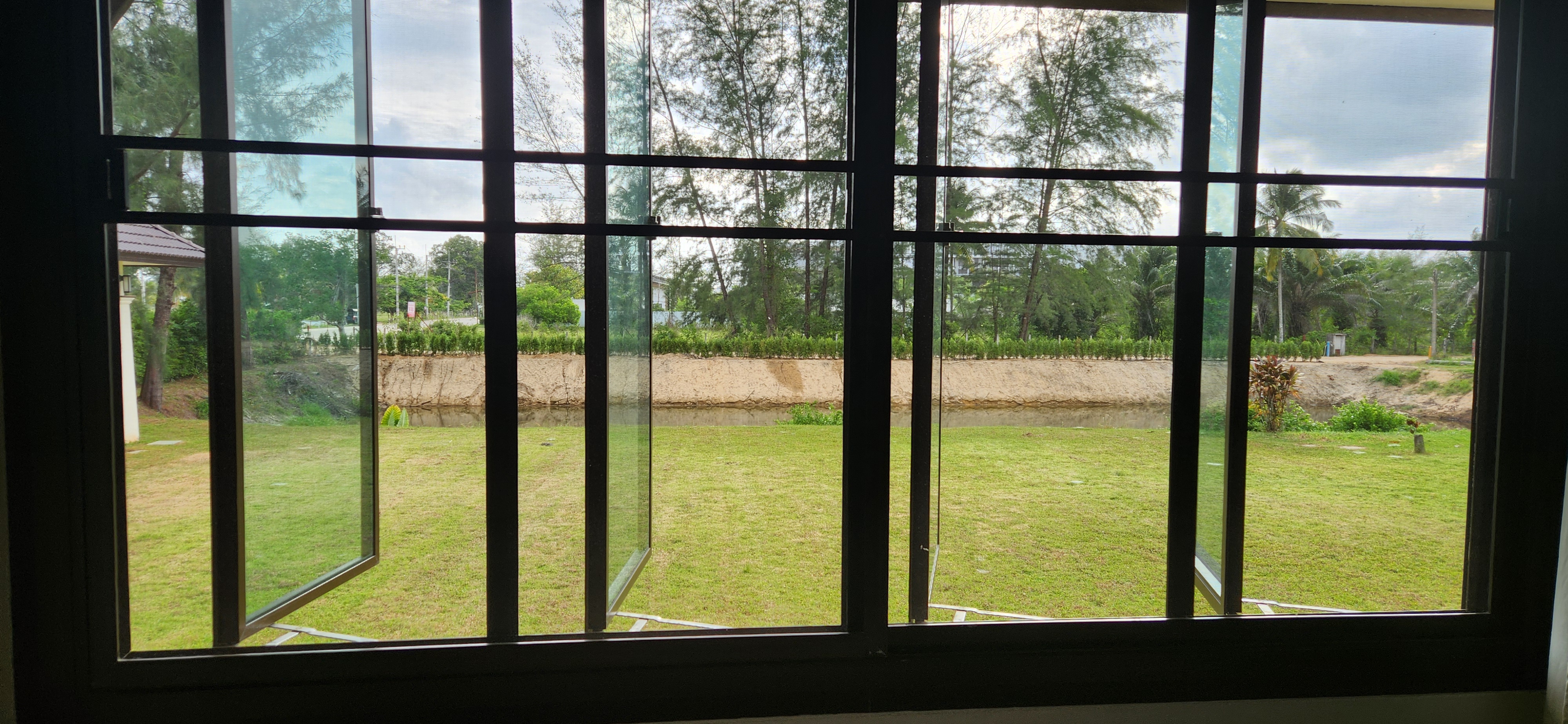 Thai Life Beach House Garden View Through Windows