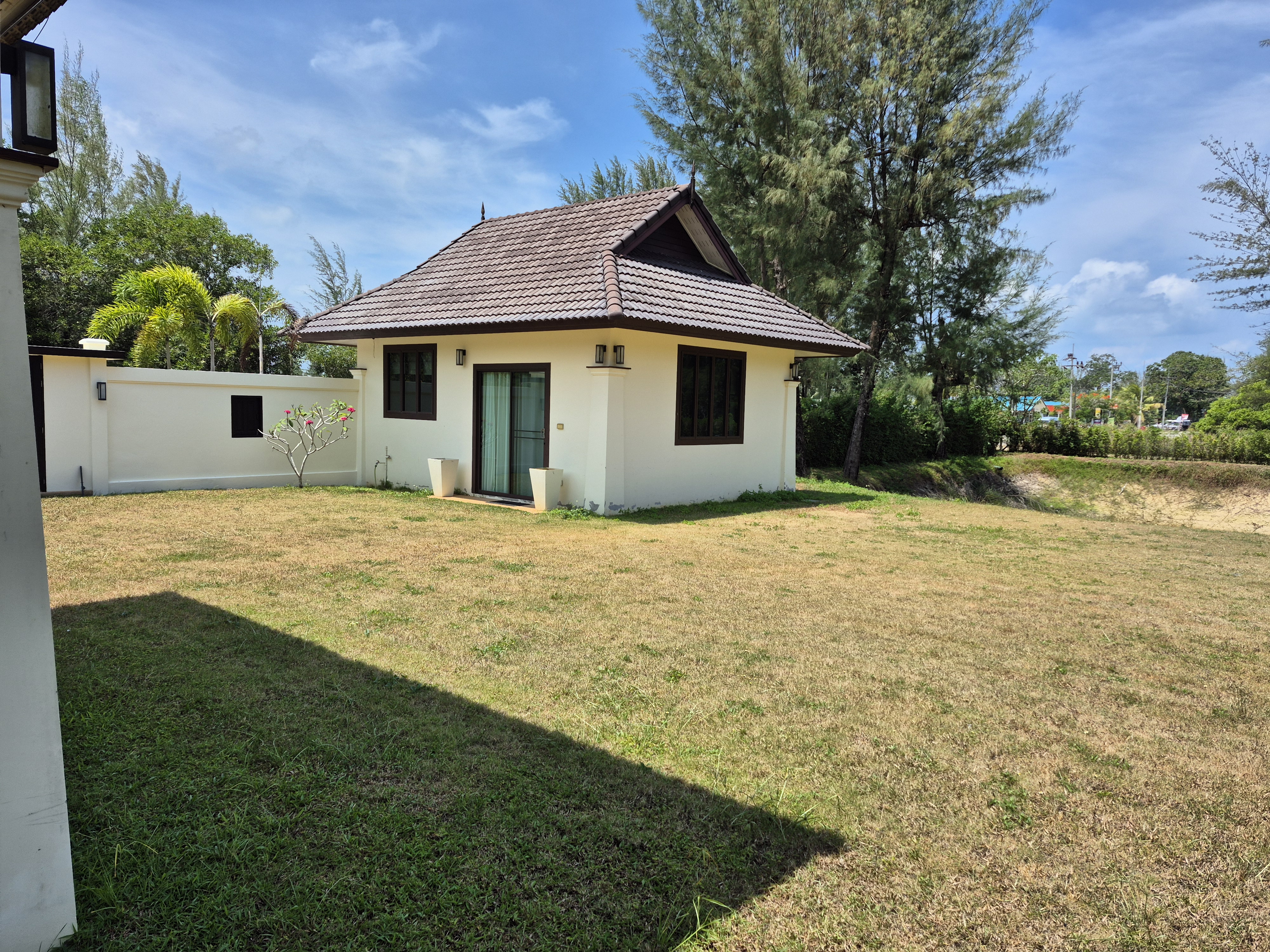 Thai Life Beach House Lawn & Side Exterior — April 2026