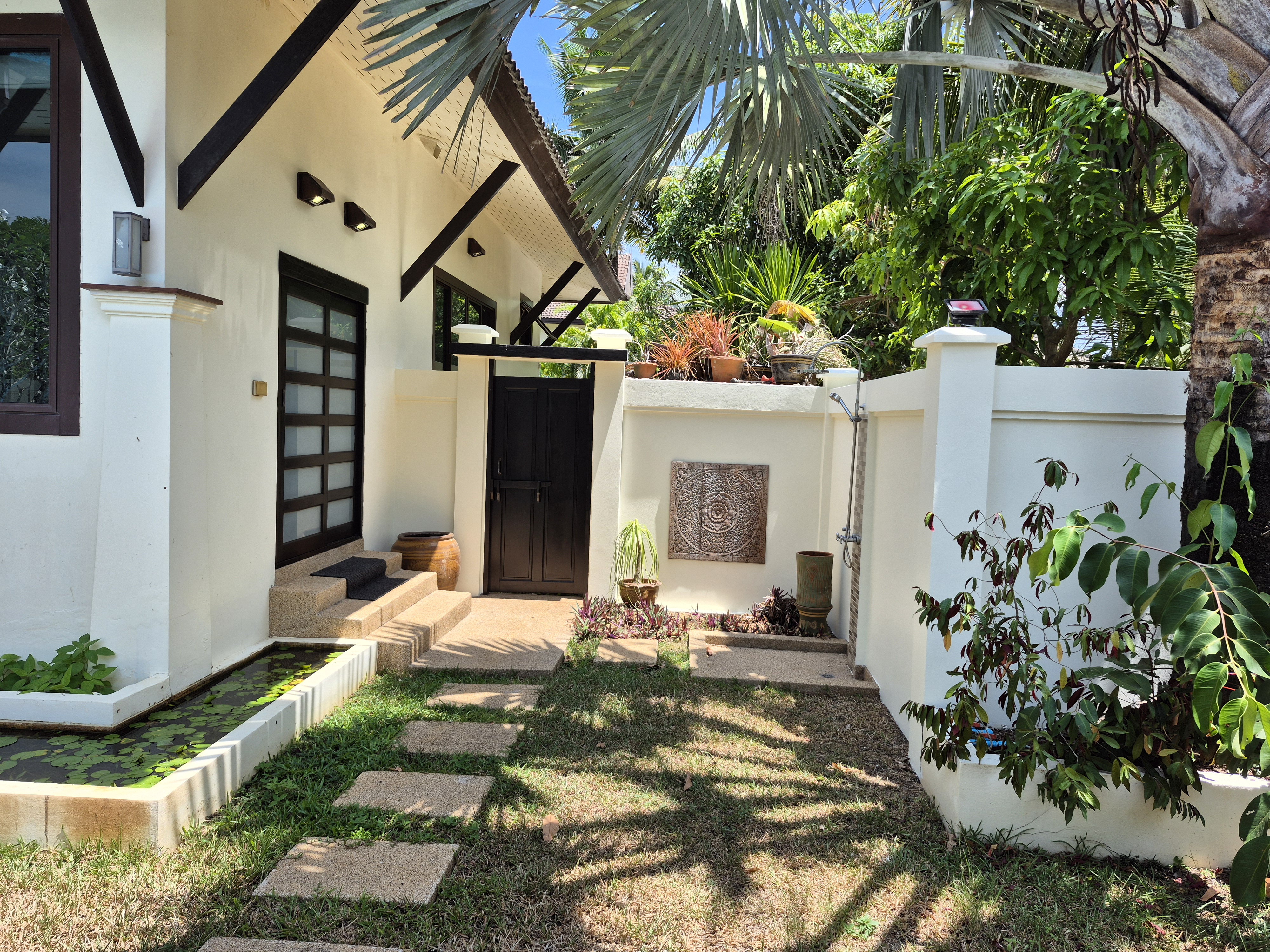 Thai Life Beach House Landscaped Walkway — April 2026