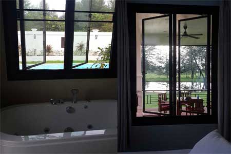 Bathroom Windows Overlooking Pool And Patio