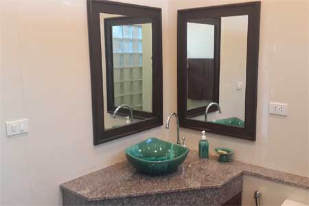 Property archive image for Thai Life Beach House showing modern bathroom vanity green sink. Supplied from the Thai Life Beach House media archive; where capture date is not known, buyers should confirm current condition for decision-critical details.