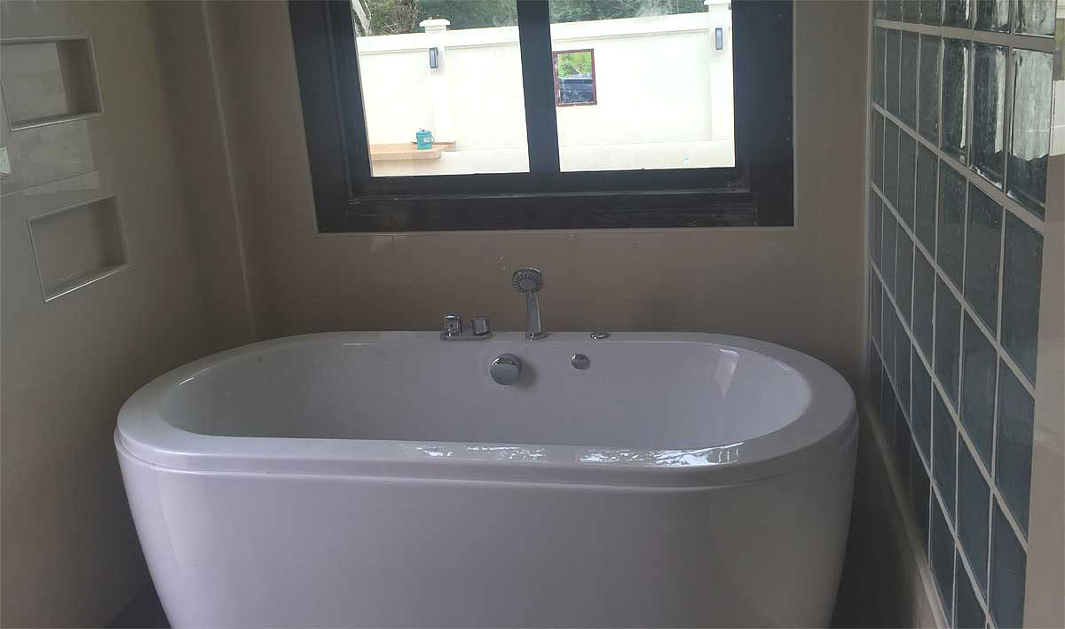Property archive image for Thai Life Beach House showing modern white bathtub bathroom window. Supplied from the Thai Life Beach House media archive; where capture date is not known, buyers should confirm current condition for decision-critical details.