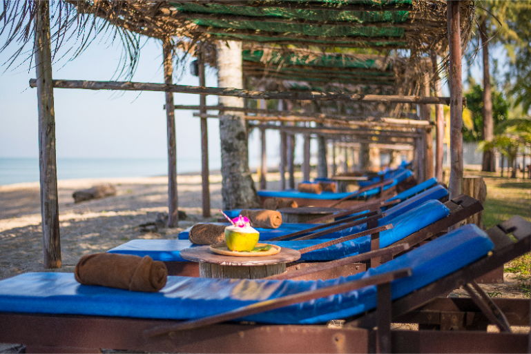 Beachfront Resort Sunbeds With Drink - ThaiLife Meditation & Wellness Resort