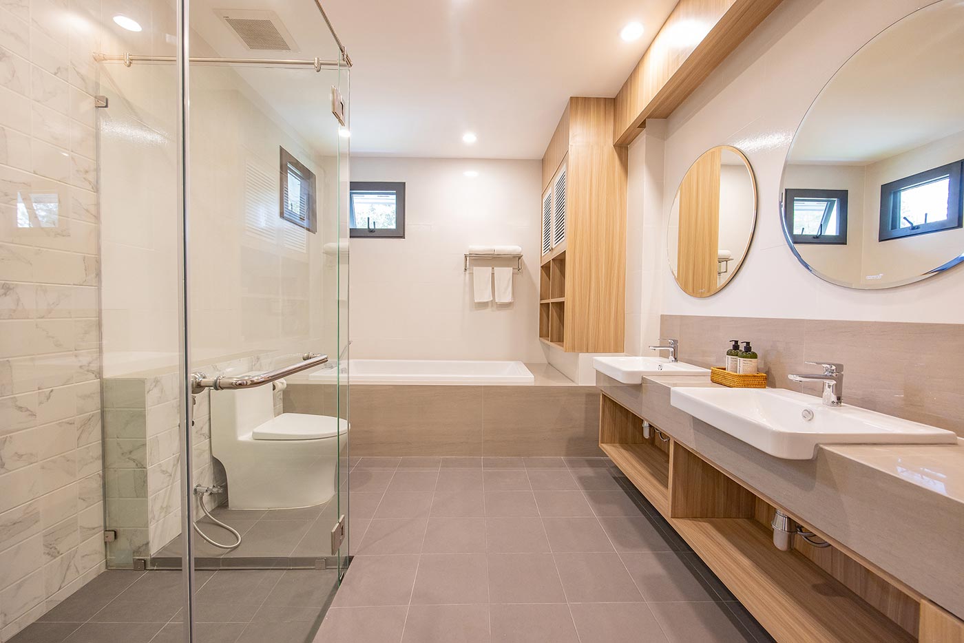 Official ThaiLife Residences project image showing modern bathroom double sinks bathtub for the Bang Muang, Takua Pa development. Confirm whether the image is completed-property photography, a show unit or a design visualisation before using it as construction-status evidence.