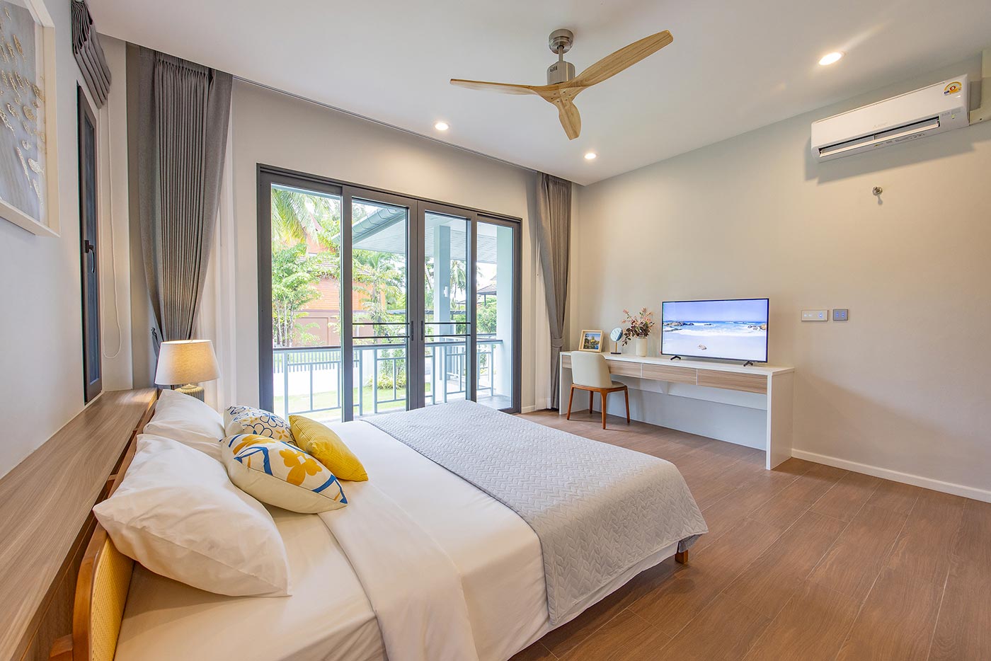 Official ThaiLife Residences project image showing modern bedroom with balcony view for the Bang Muang, Takua Pa development. Confirm whether the image is completed-property photography, a show unit or a design visualisation before using it as construction-status evidence.