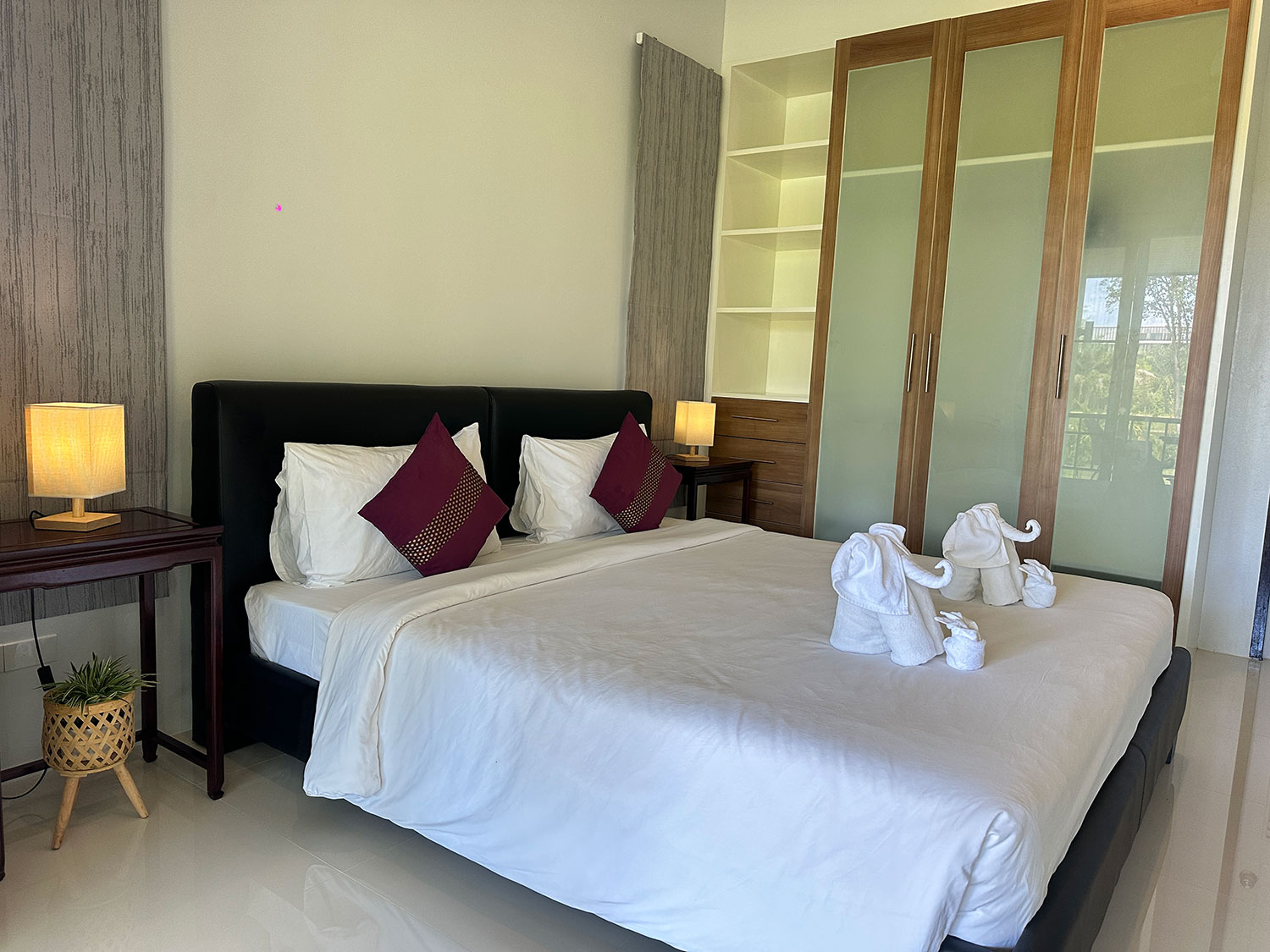 Official ThaiLife Residences project image showing modern bedroom with bed and wardrobe for the Bang Muang, Takua Pa development. Confirm whether the image is completed-property photography, a show unit or a design visualisation before using it as construction-status evidence.