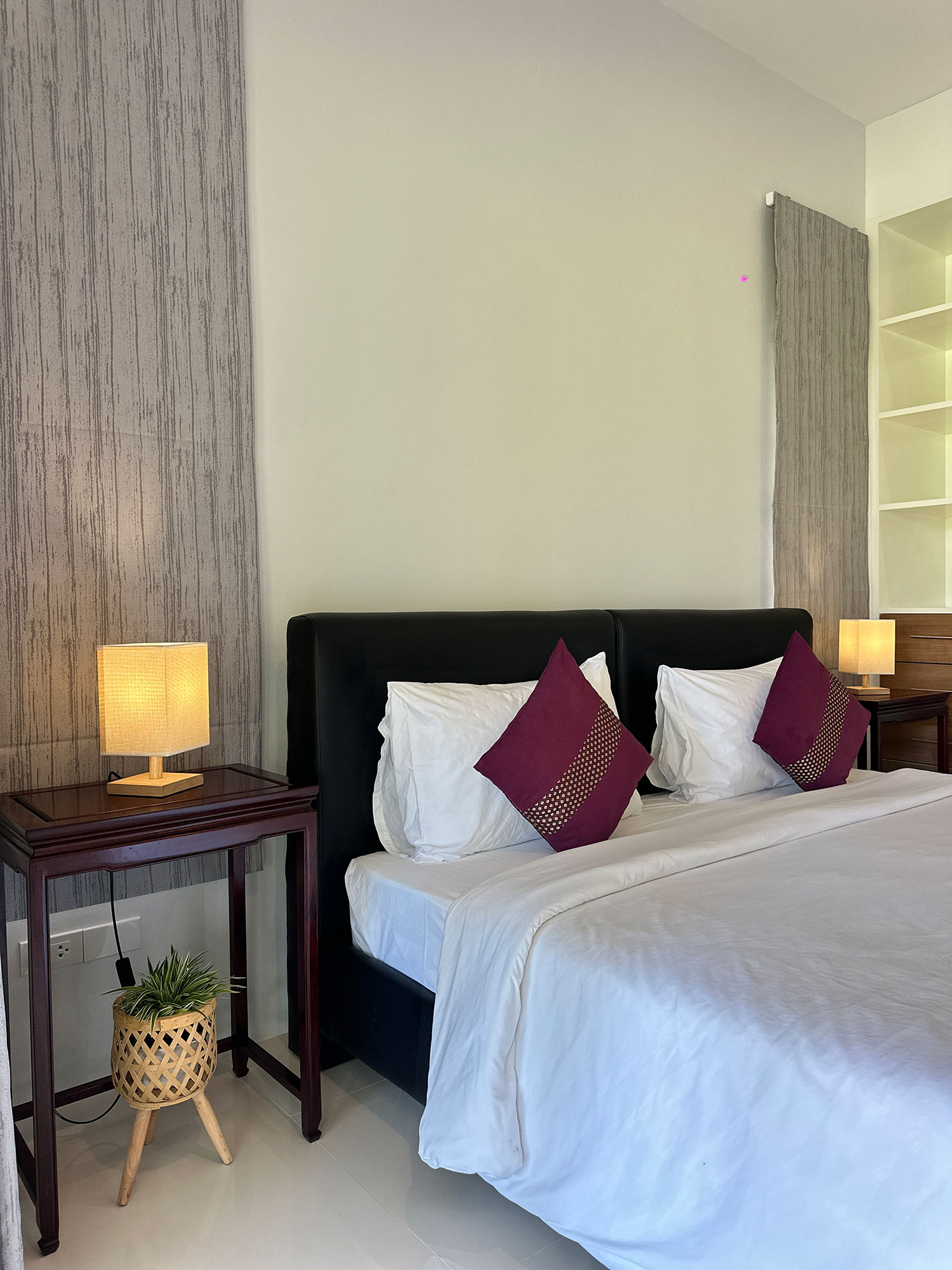 Official ThaiLife Residences project image showing modern bedroom with elegant bed and lamps for the Bang Muang, Takua Pa development. Confirm whether the image is completed-property photography, a show unit or a design visualisation before using it as construction-status evidence.