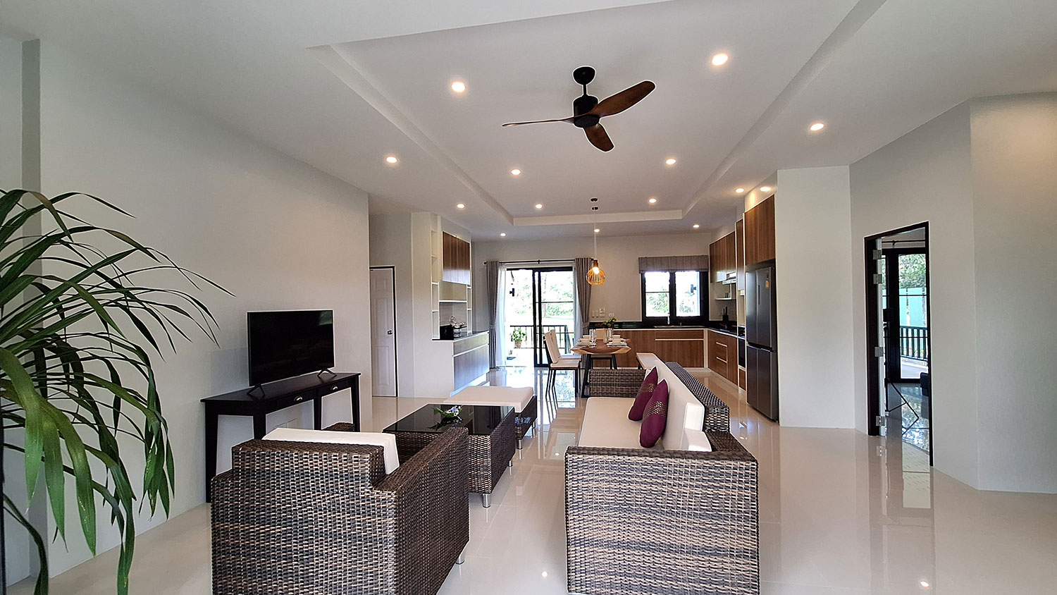 Official ThaiLife Residences project image showing modern open living room kitchen residence for the Bang Muang, Takua Pa development. Confirm whether the image is completed-property photography, a show unit or a design visualisation before using it as construction-status evidence.