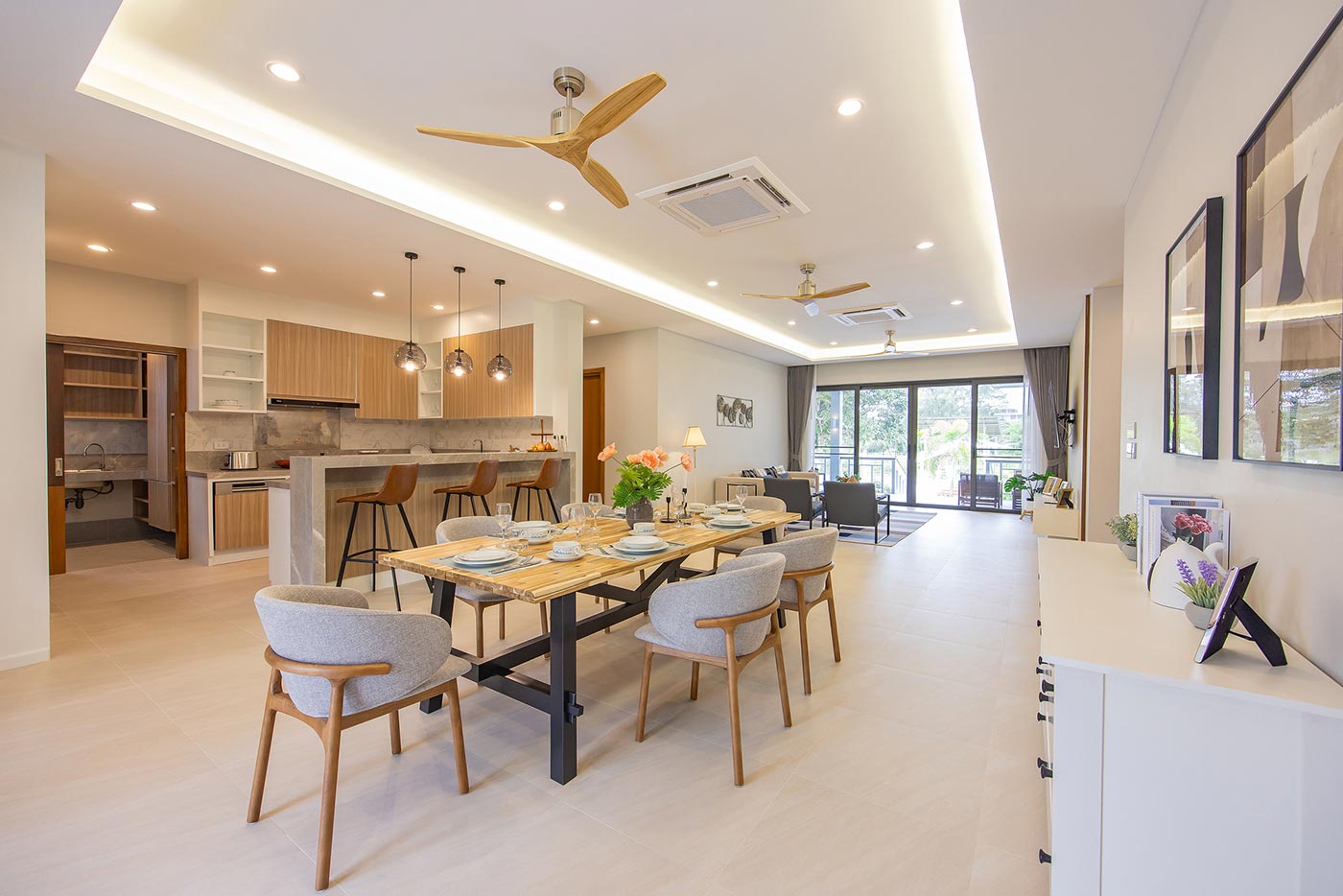 Official ThaiLife Residences project image showing modern open plan dining living area for the Bang Muang, Takua Pa development. Confirm whether the image is completed-property photography, a show unit or a design visualisation before using it as construction-status evidence.